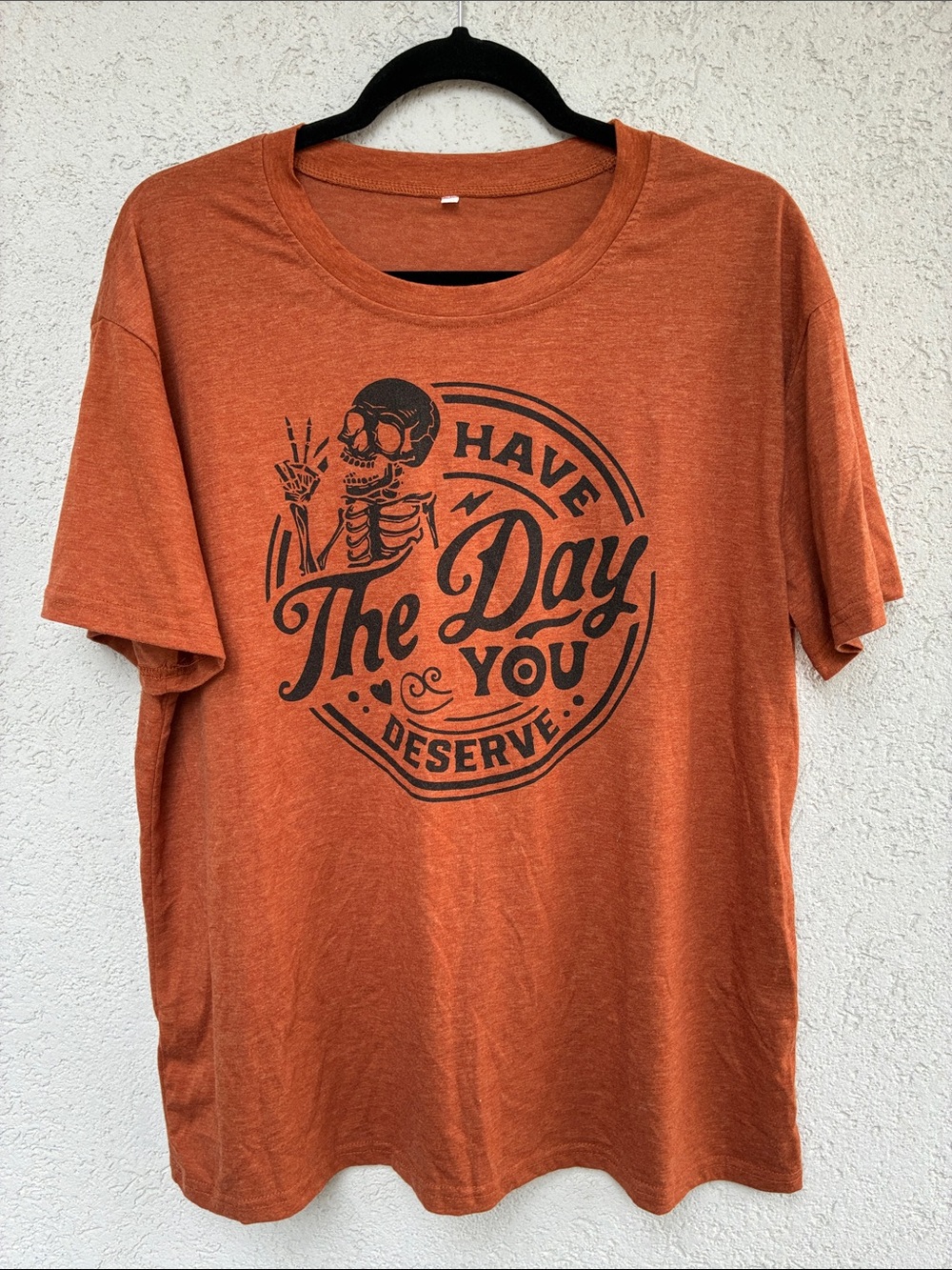 Orange “Have The Day You Deserve” skeleton soft T shirt